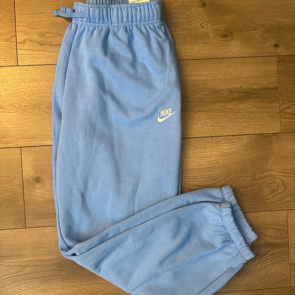 Nike women Blue Fleece Joggers with White Logo